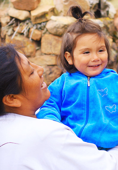 Native American Women holding little girl