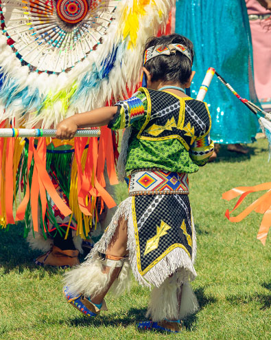 Little boy dressed in Native Pow wow attire
